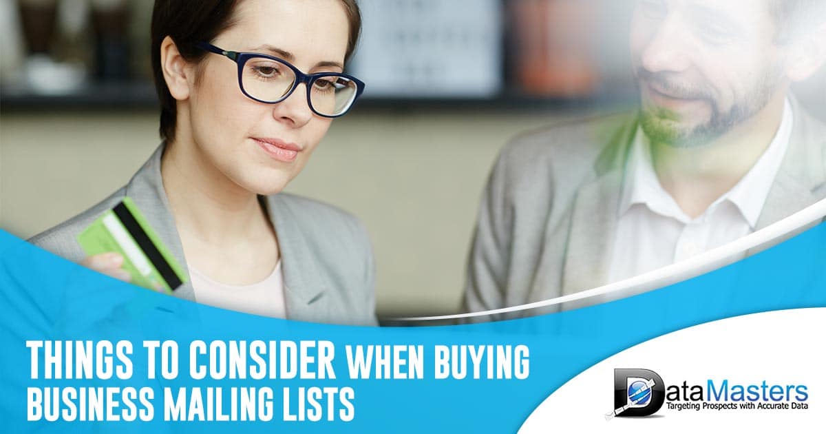 Photo of a woman and man reading and the text: Things to Consider When Buying Business Mailing Lists
