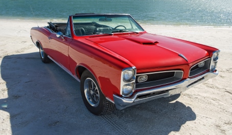 Classic car restored GTO with all insigna's removed. Convertible American car from the 1960's.