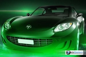 Image of a dark green sports car seen from the front grill side